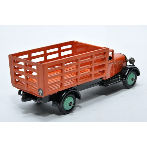 642 - Dinky No. 25f Market Garden Wagon. Issue is in orange, with green hubs, as shown. Displays very good... 