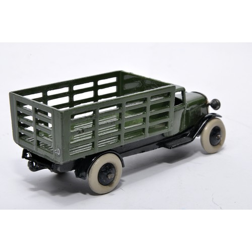 643 - Dinky No. 25f Market Garden Wagon. Issue is in dark green, with black hubs, as shown. Displays very ... 