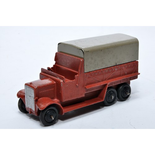 657 - Dinky No. 25s six wheeled covered wagon. Issue is in brick red, as shown. Displays generally good to... 