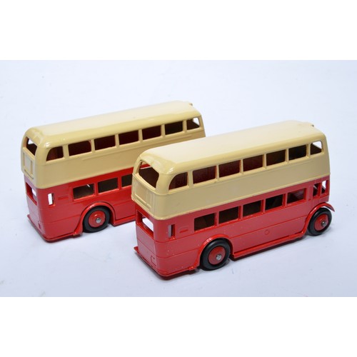 659 - Dinky No. 29c Double Decker Bus. Duo of issues in red and cream as shown (note baseplate variations)... 