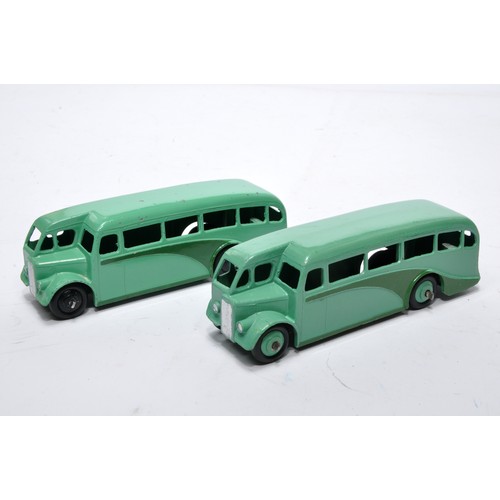 664 - Dinky No. 29e Single Deck Bus. Duo of issues intwo-tone green as shown (note hub colour variations).... 