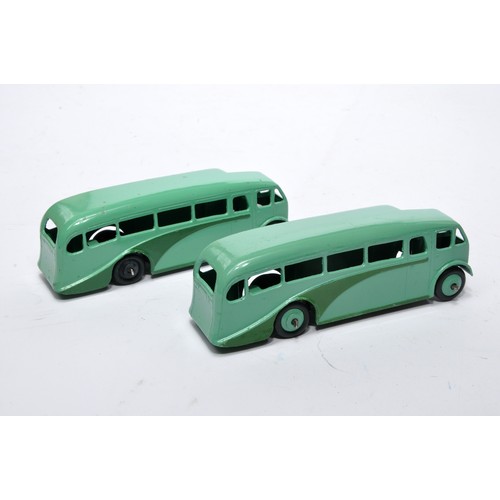 664 - Dinky No. 29e Single Deck Bus. Duo of issues intwo-tone green as shown (note hub colour variations).... 
