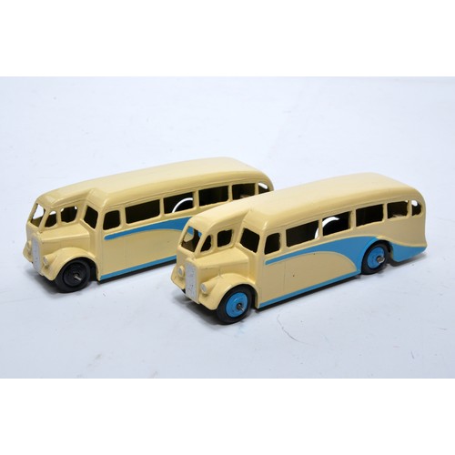 665 - Dinky No. 29e Single Deck Bus. Duo of issues in two-tone cream and blue as shown (note hub colour va... 