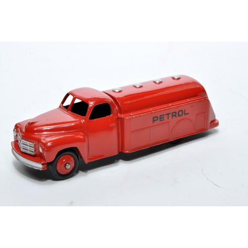 675 - Dinky No. 30p Studebaker Petrol Tanker. Single issue is in red, inc hubs, as shown. Displays general... 