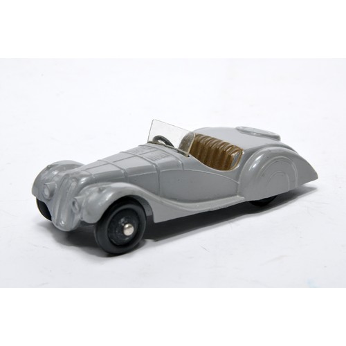 699 - Dinky No. 38a Frazer Nash. Single issue is in grey with brown interior, as shown. Displays generally... 