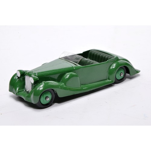 704 - Dinky No. 38c Lagonda. Single issue is in green with darker green interior, as shown. Displays gener... 