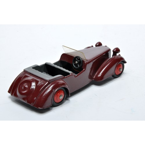 705 - Dinky No. 38d Alvis. Single issue is in maroon with dark grey interior, as shown. Displays generally... 