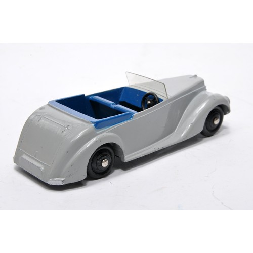 707 - Dinky No. 38e Armstrong Siddeley. Single issue is in grey with dark blue interior, as shown. Display... 