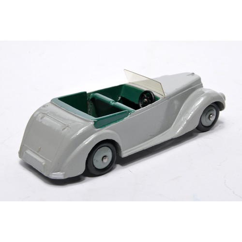 709 - Dinky No. 38e Armstrong Siddeley. Single issue is in grey with dark green interior, plus grey hubs, ... 