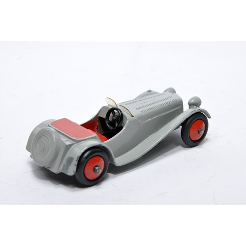 710 - Dinky No. 38f Jaguar SS. Single issue is in grey with red interior inc hubs, as shown. Displays gene... 