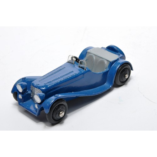 714 - Dinky No. 38f Jaguar SS. Single issue is in dark blue with grey interior, as shown. Displays general... 