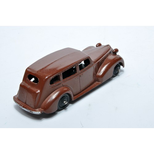 717 - Dinky No. 39a Packard. Single issue is in brown, as shown. Displays generally good to very good, wit... 