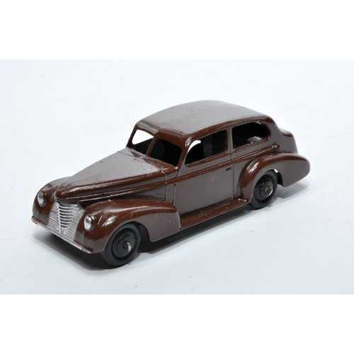 719 - Dinky No. 39b Oldsmobile. Single issue is in chocolate brown, as shown. Displays generally very good... 
