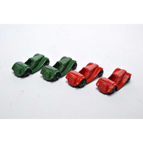 742 - Dinky No. 35c MG Sports Car. Four issues in Red and Green, as shown. Items display generally fair to... 