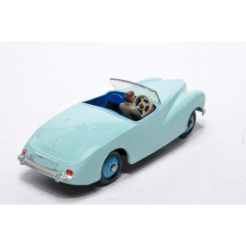 756 - Dinky No. 101 Sunbeam Alpine. Single issue is in light blue, dark blue interior, with mid blue hubs,... 