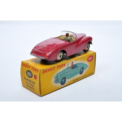 757 - Dinky No. 101 Sunbeam Alpine. Single issue is in cerise, with cream interior, light fawn hubs, plus ... 