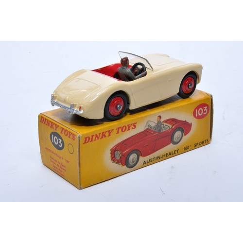 761 - Dinky No. 103 Austin Healey 100 Sports. Single issue is in cream, with red interior, red hubs, plus ... 