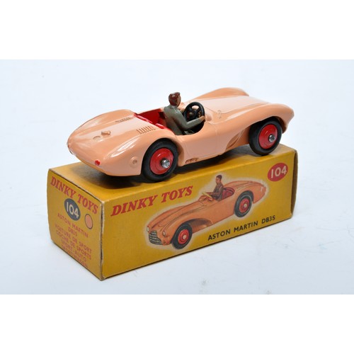 762 - Dinky No. 104 Aston Martin DB3S. Single issue is in pink, with red interior, red hubs, plus driver, ... 