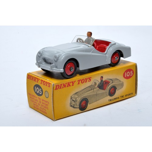 764 - Dinky No. 105 Triumph TR2 Sports. Single issue is in grey, with red interior, red hubs, plus driver,... 