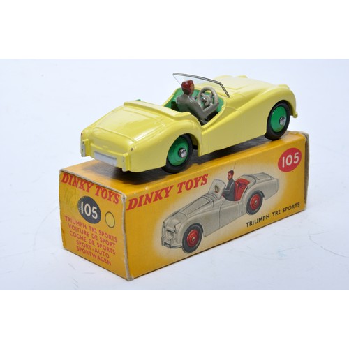 765 - Dinky No. 105 Triumph TR2 Sports. Single issue is in yellow, with green interior, green hubs, plus d... 