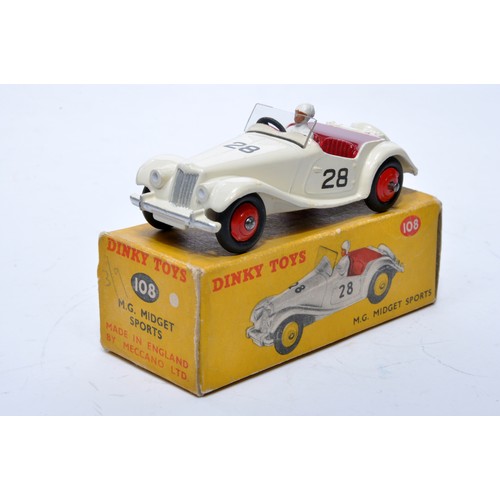 771 - Dinky No. 108 MG Midget Sports. Single issue is in white, RN28 with maroon interior, and red hubs, a... 