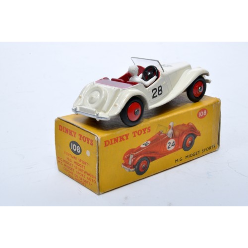 771 - Dinky No. 108 MG Midget Sports. Single issue is in white, RN28 with maroon interior, and red hubs, a... 