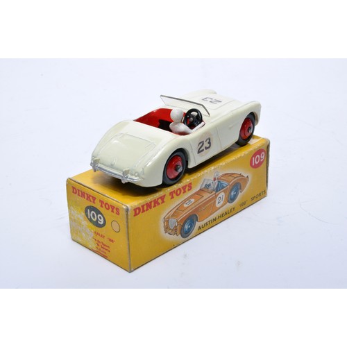 773 - Dinky No. 109 Austin Healey 100 Sports. Single issue is in off-white, RN23 with red interior, and re... 