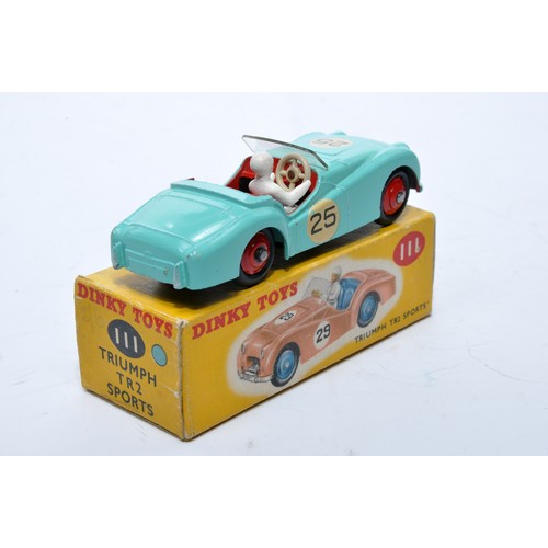 776 - Dinky No. 111 Triumph TR2 Sports. Single issue is in mint green, RN25 with red interior, and red hub... 