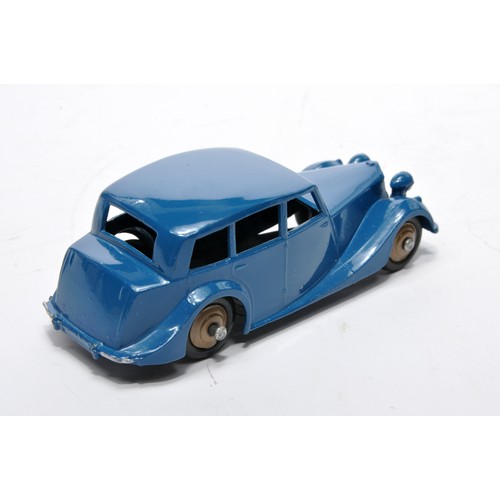786 - Dinky No. 151 Triumph 1800 Saloon. Single issue is in dark blue, with dark fawn hubs, as shown. Disp... 