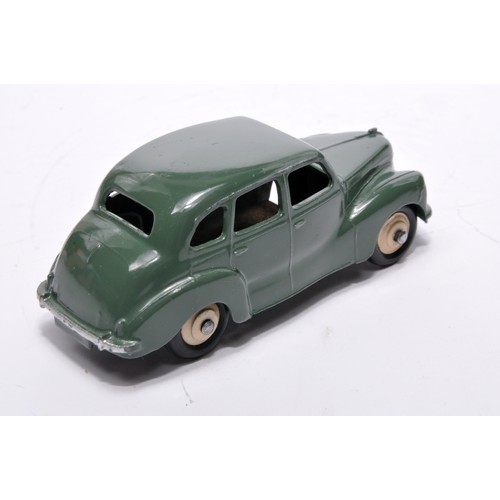 789 - Dinky No. 152 Austin Devon. Single issue is in dark green, with cream hubs, as shown. Displays gener... 