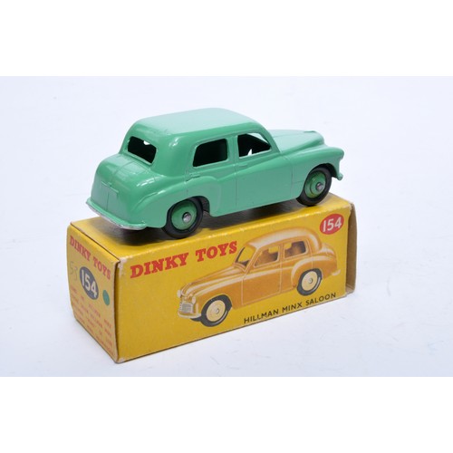 793 - Dinky No. 154 Hillman Minx Saloon. Single issue is in mint green, with green hubs, as shown. Display... 