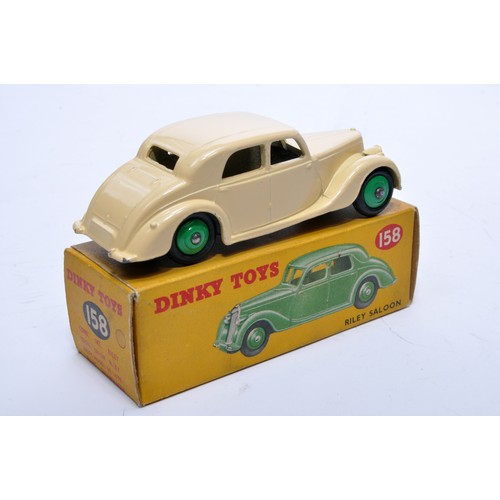 812 - Dinky No. 158 Riley Saloon. Single issue is in cream, with green hubs, as shown. Displays generally ... 