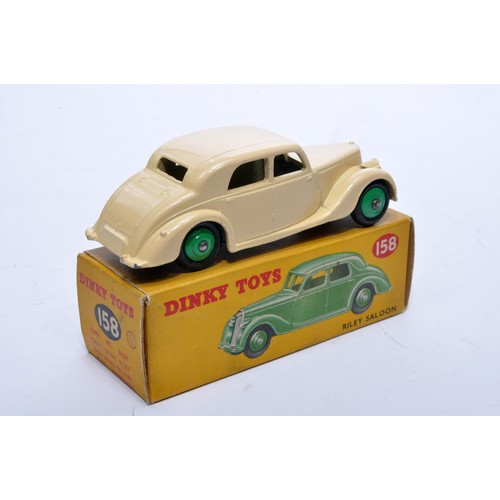 812 - Dinky No. 158 Riley Saloon. Single issue is in cream, with green hubs, as shown. Displays generally ... 