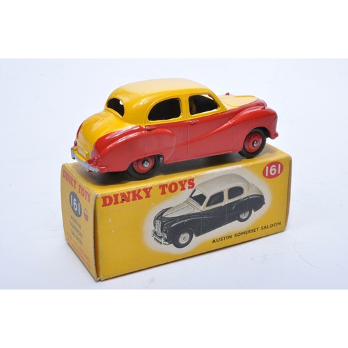 820 - Dinky No. 161 Austin Somerset Saloon. Single issue is in two-tone yellow and red, with red hubs, as ... 