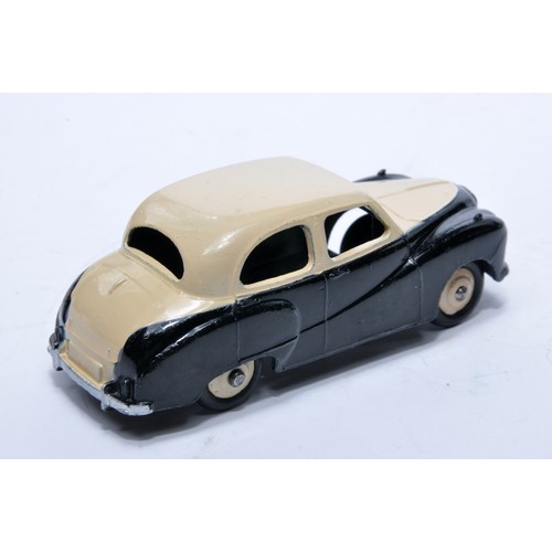 821 - Dinky No. 161 Austin Somerset Saloon. Single issue is in two-tone cream and black, with cream hubs, ... 
