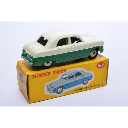 827 - Dinky No. 162 Ford Zephyr Saloon. Single issue is in two-tone cream and green, with cream hubs, as s... 