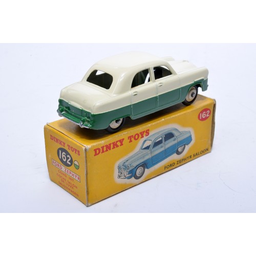 829 - Dinky No. 162 Ford Zephyr Saloon. Single issue is in two-tone cream and green, with cream hubs, as s... 