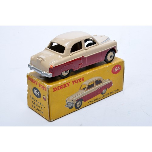 830 - Dinky No. 164 Vauxhall Cresta Saloon. Single issue is in two-tone cerise and darker cream, with crea... 