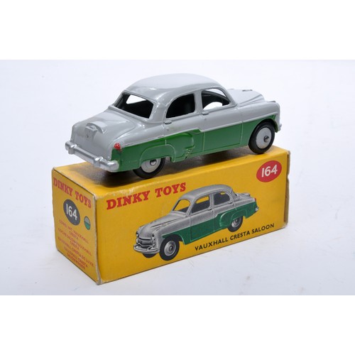 831 - Dinky No. 164 Vauxhall Cresta Saloon. Single issue is in two-tone grey and green, with grey hubs, as... 