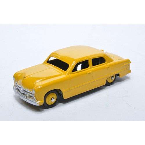 843 - Dinky No. 139a/170 Ford Fordor Sedan. Single issue is in yellow, with yellow hubs, as shown. Display... 