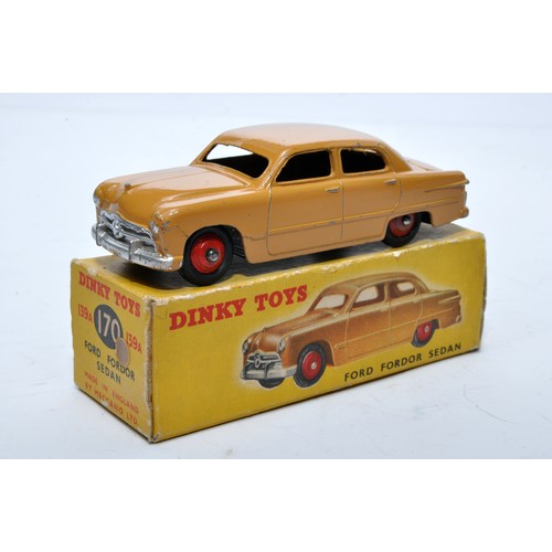 845 - Dinky No. 139a/170 Ford Fordor Sedan. Single issue is in tan, with red hubs, as shown. Displays gene... 