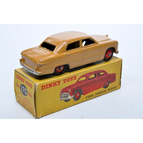 845 - Dinky No. 139a/170 Ford Fordor Sedan. Single issue is in tan, with red hubs, as shown. Displays gene... 