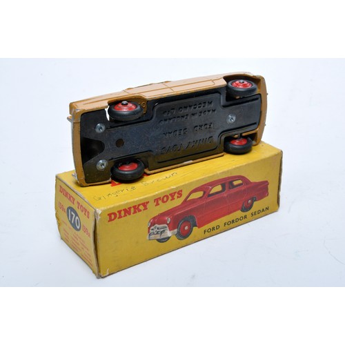 845 - Dinky No. 139a/170 Ford Fordor Sedan. Single issue is in tan, with red hubs, as shown. Displays gene... 