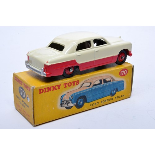 846 - Dinky No. 170 Ford Fordor Sedan. Single issue is in two-tone cream and red, with red hubs, as shown.... 