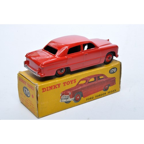 847 - Dinky No. 170 Ford Fordor Sedan. Single issue is in  red, with red hubs, as shown. Displays generall... 