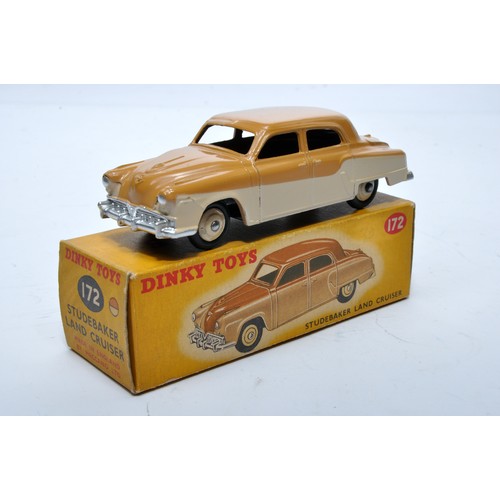 852 - Dinky No. 172 Studebaker Land Cruiser. Single issue is in two-tone tan and beige, with cream hubs, a... 