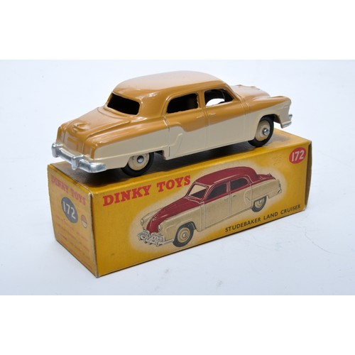 852 - Dinky No. 172 Studebaker Land Cruiser. Single issue is in two-tone tan and beige, with cream hubs, a... 