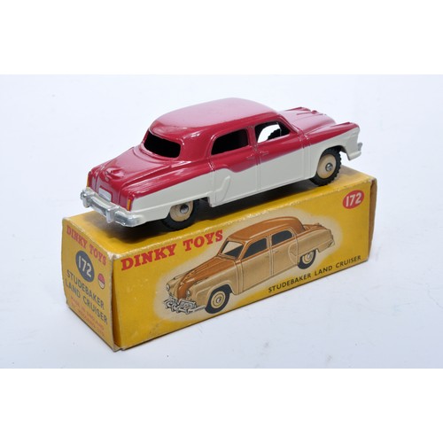 853 - Dinky No. 172 Studebaker Land Cruiser. Single issue is in two-tone cerise and cream, with beige hubs... 