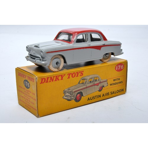 863 - Dinky No. 176 Austin A105 Saloon. Single issue is in two tone red and grey with red flash, with grey... 