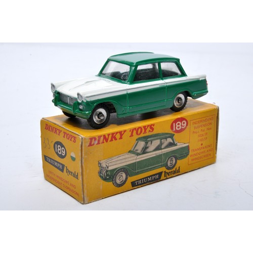 876 - Dinky No. 189 Triumph Herald. Single issue is in two-tone white and green, with chrome hubs, as show... 